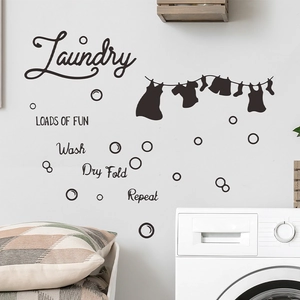 Laundry room wall decal with wash dry fold repeat quotes and hanging clothes silhouettes