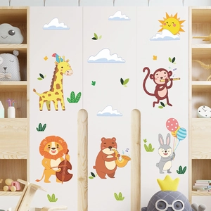 Cartoon animal wall stickers with giraffe and lion for nursery decor on white wardrobe