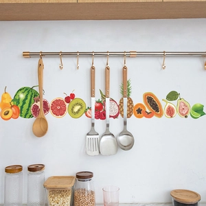 Sticker mural de cuisine avec tranches de fruits colorées comme pastèque et kiwi sur carreaux