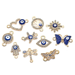 10-teiliges Set vergoldeter Evil Eye Verbinder mit blauem Emaille und Zirkonia Steinen
