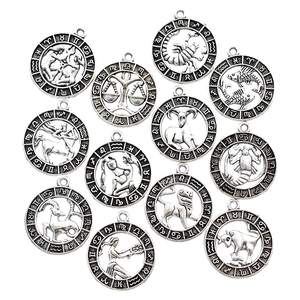 Set of 12 vintage silver zodiac charms with astrological symbols for DIY jewelry making