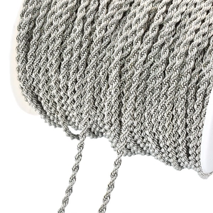 Close-up of silver twisted rope chain on a spool for DIY jewelry making material