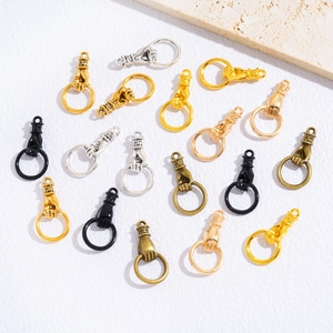 DIY retro alloy hand fist pendants in gold silver and bronze colors for jewelry making