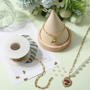 DIY gold paperclip chain and jewelry components with red heart and pearl charms