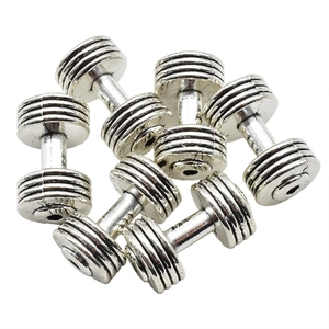 Antique silver dumbbell charms for DIY jewelry making, flat lay on white background