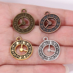 Mixed set of 4 vintage punk alloy clock gear pendants in bronze, gold, and silver
