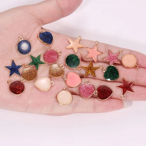 Glittery heart star round DIY jewelry charms with gold metal edges in assorted colors