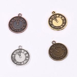 DIY retro clock gear charms in copper, gold, silver, and bronze finishes