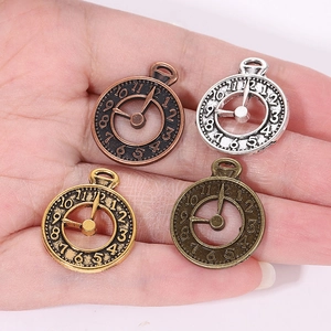 Set of four 25x20mm vintage clock pendants in antique bronze, gold, and silver alloy finishes