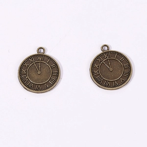 Detail of antique bronze clock gear charms with Roman numerals for punk DIY jewelry