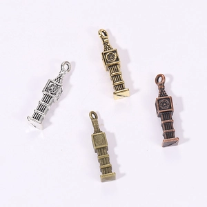 Detailed macro view of retro alloy Big Ben clock pendants in four assorted vintage colors