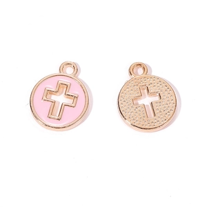 Detail of pink enamel and textured gold cross pendants for DIY jewelry making