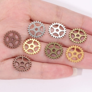 Set of 8 steampunk DIY metal gears in mixed metallic finishes for jewelry making