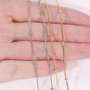 Delicate copper box chain with metal beads in gold silver and rose gold colors