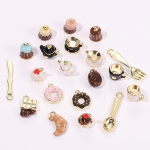 Miniature food charms featuring croissants and coffee cups for DIY jewelry making