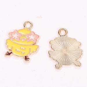 Detail of yellow chick zinc alloy charms with star sunglasses for DIY jewelry making
