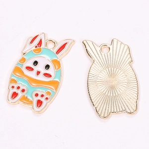 Front and back view of golden rabbit enamel charms for Easter jewelry making