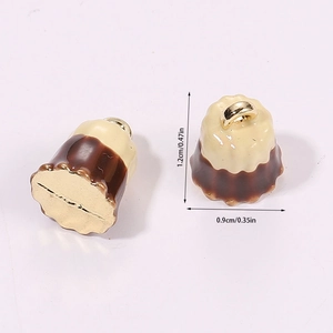 Detailed macro view showing the 1.2cm 3D miniature Cannelé pendant charm dimensions