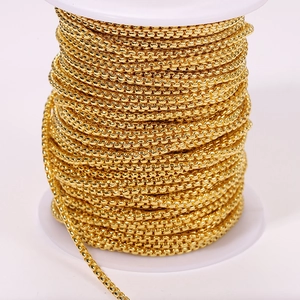 Detail view of 304 stainless steel gold bead chain on a roll for DIY jewelry making