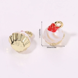 Detailed view of cupcake pendant dimensions 1.1cm by 0.9cm for DIY jewelry making