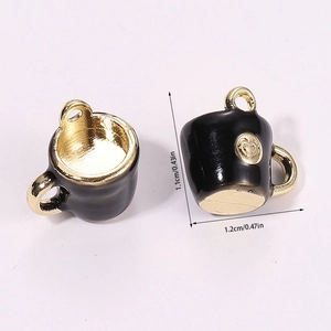Miniature black enamel coffee cup pendant with gold metal trim measuring 1.1x1.2cm