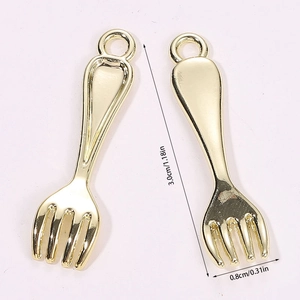Macro shot of 3.0cm mini golden fork pendants with dimensions for DIY jewelry making