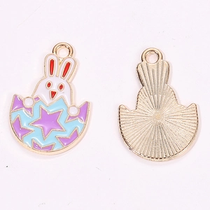 Detailed macro view showing the front enamel bunny egg charm and back metal texture