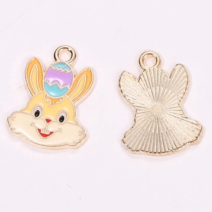 Detailed front and back view of enamel Easter bunny charms for DIY jewelry making