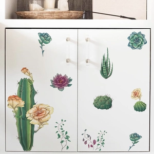 Stickers muraux cactus tropicaux décorant une armoire blanche de style moderne