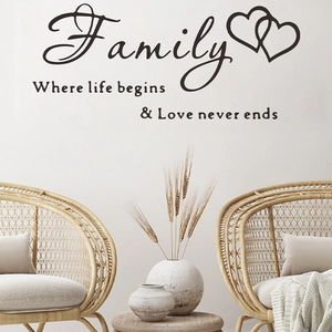 Family quote wall decal for living room with hearts and elegant script lettering