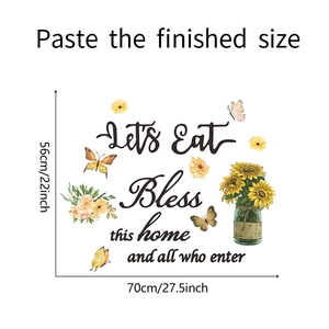Dettaglio dell'adesivo murale girasole e farfalla con scritta Let's Eat e misura 56cm