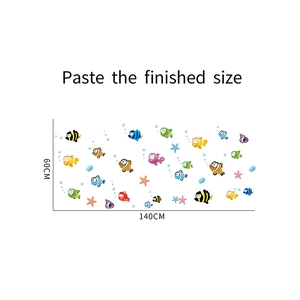 Detailed size chart for underwater cartoon fish wall stickers measuring 60cm by 140cm