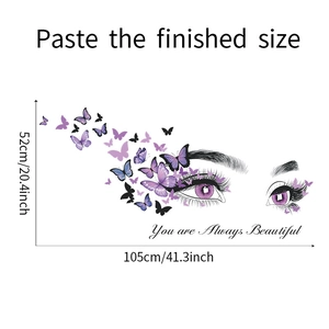 Detail of eye and purple butterfly wall sticker with You are Always Beautiful text