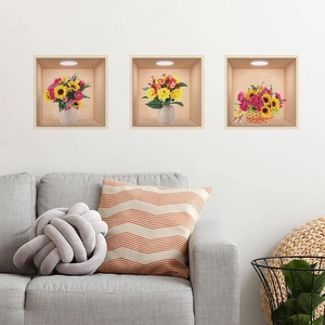 Set of three 3D floral wall stickers featuring sunflowers and roses for living room decor