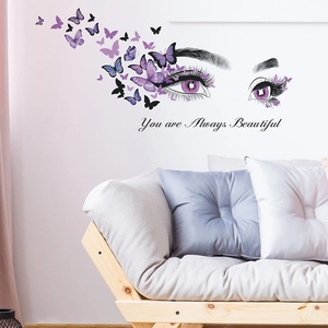 Creative wall sticker featuring female eyes with purple butterflies and inspirational quote