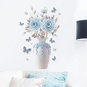 3D floral wall stickers featuring blue roses, a white embossed vase, and butterflies