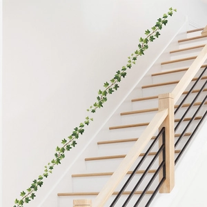 Artificial hanging ivy vine with green leaves for home wall decor and indoor staircase decoration