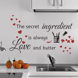 Kitchen wall sticker with 'The secret ingredient is always Love and butter' and heart icons