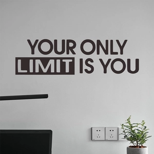 Minimalist motivational wall sticker featuring Your Only Limit Is You quote in black