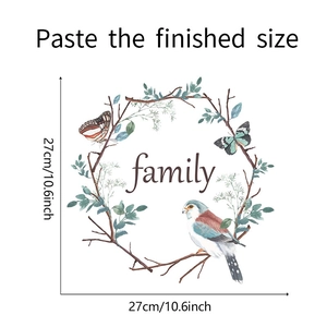 Détail du sticker mural couronne famille et oiseau avec dimensions de 27x27 cm