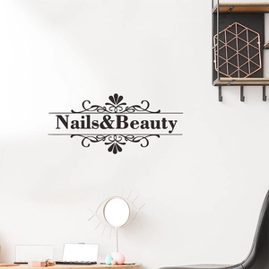 Elegant Nails & Beauty vinyl wall decal with decorative swirls on white background