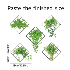 Detail showing dimensions of green plant wall stickers with black grid patterns