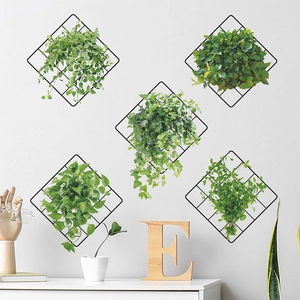 Modern black metal diamond mesh wall decor with artificial greenery vines for home interiors
