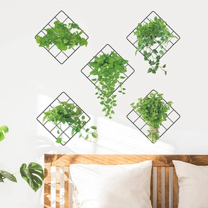 Minimalist black diamond metal grid wall plant trellis for home decor with green vines