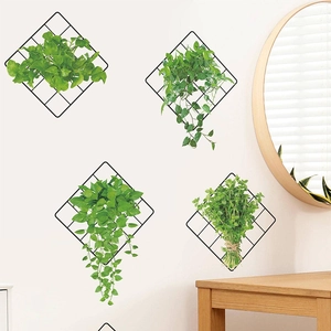 Minimalist black iron wall grid rack for plants on white indoor wall with wooden furniture