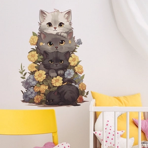 Cartoon cats wall sticker with flowers for nursery decor in a warm home setting