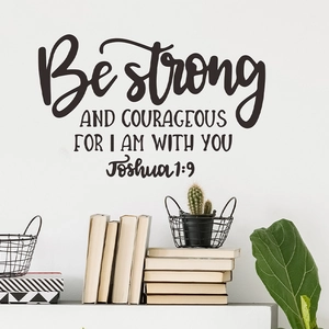 Be Strong and Courageous Joshua 1:9 black quote wall decal in a modern living room
