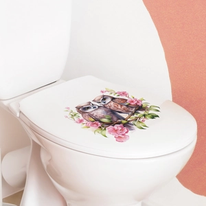 Autocollant hiboux mignons sur branches et fleurs de cerisier sur abattant de WC blanc