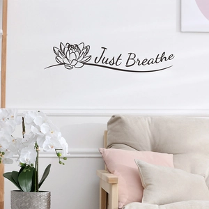 Minimalist lotus wall sticker with Just Breathe quote for zen home living room decor
