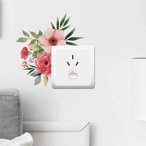Pink peony and green leaves wall sticker decorating a standard home power socket